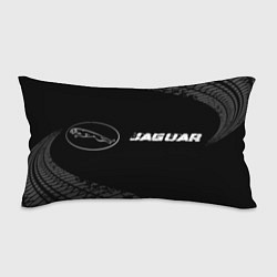 Подушка-антистресс Jaguar Speed на темном фоне со следами шин