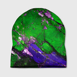 Шапка A purple mineral in a green stone