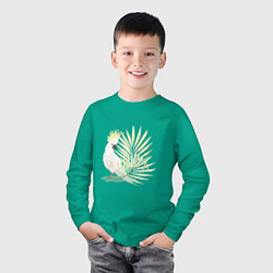 Лонгслив хлопковый детский Белый попугай с хохолком на фоне листьев пальмы, цвет: зеленый — фото 2